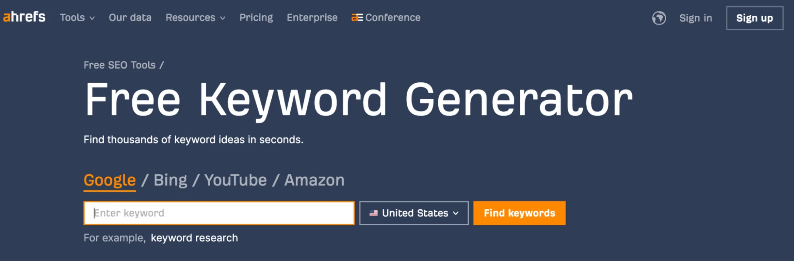 The homepage of the Ahrefs Free Keyword Generator has a dark blue background