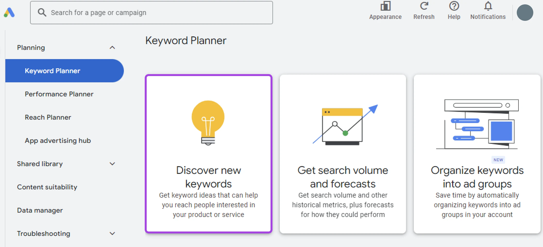 In "Keyword Planner," the left-most tile "Discover new keywords" with a lightbulb illustration is selected.